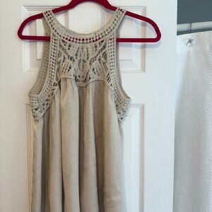 Cream top with lace neck and button back